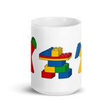 Meeples Playing with Toy Building Bricks Colorful Mug